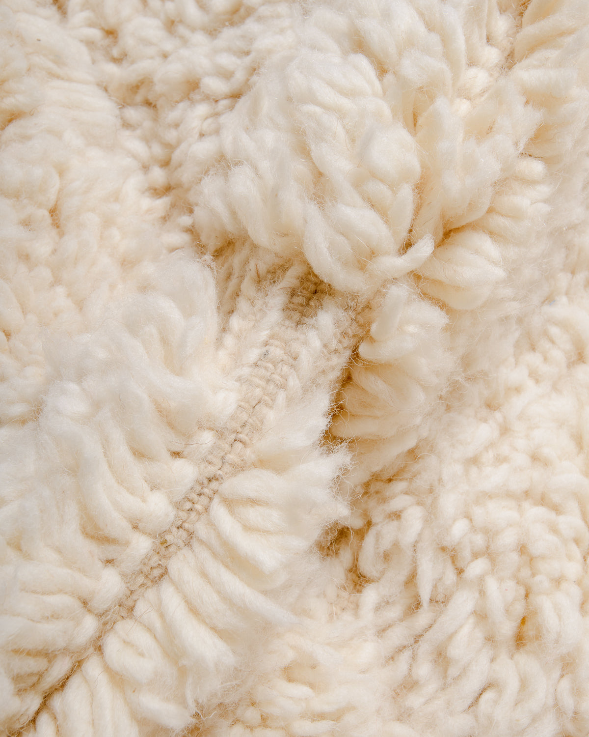 Detail of wool Berber rug showing density of pile.